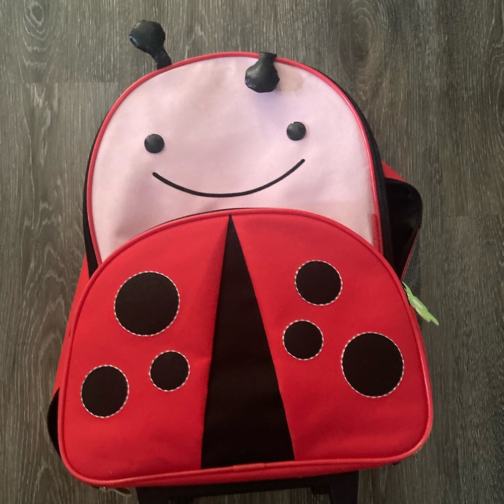 Skip Hop ladybug rolling suitcase